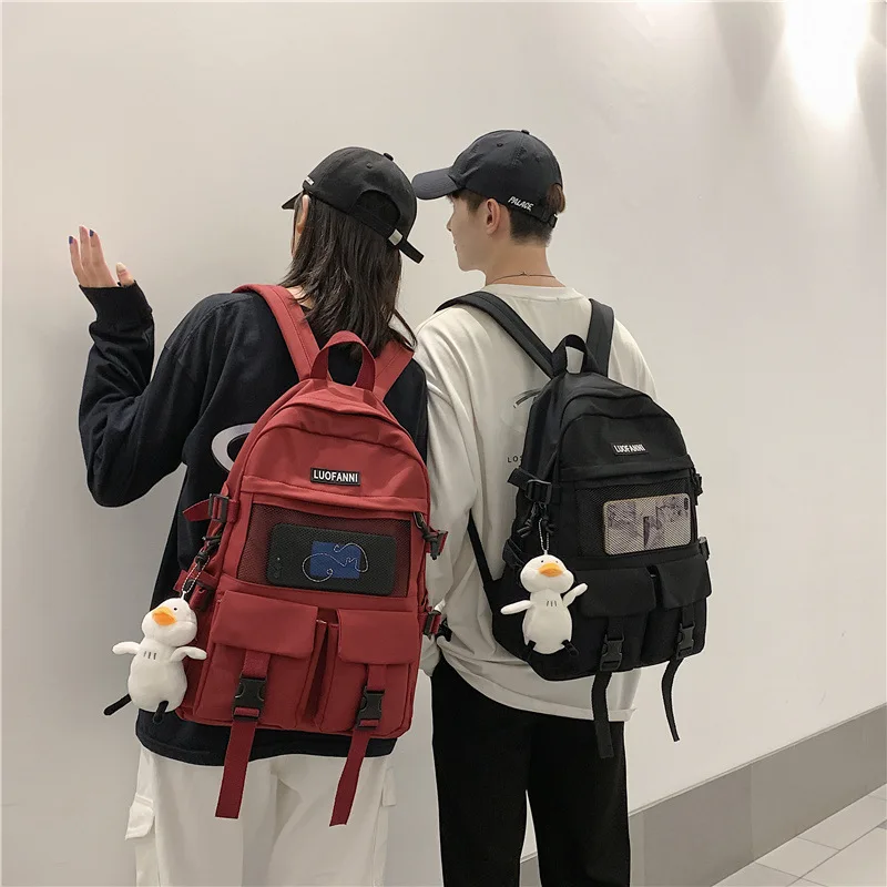 Koolikott naine korea versiooni lihtne õpilane seljakott paari seljakoti meeste mood seljakott reisikott kooli seljakott