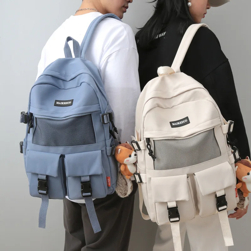 Koolikott naine korea versiooni lihtne õpilane seljakott paari seljakoti meeste mood seljakott reisikott kooli seljakott Pilt 1 